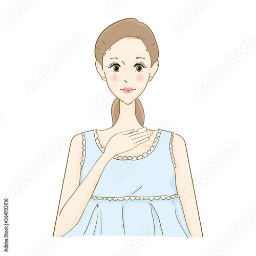 化粧品を塗る女性　デコルテ