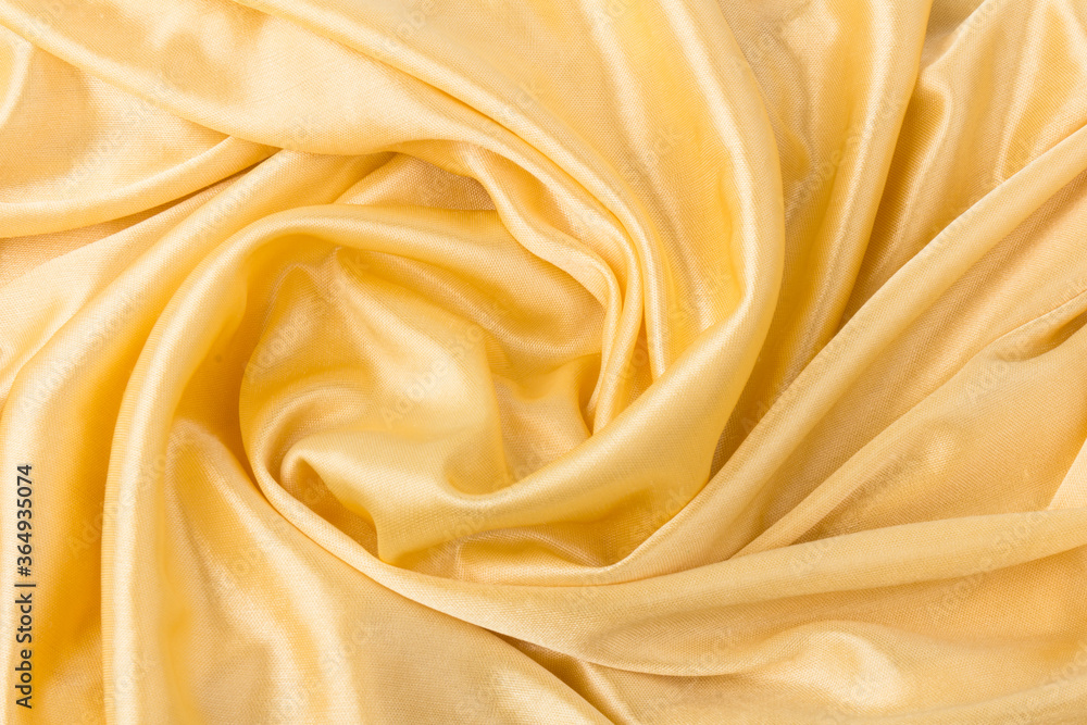 Fototapeta premium Smooth elegant golden silk or satin luxury cloth texture can use as wedding background. Luxurious background design. Retro style