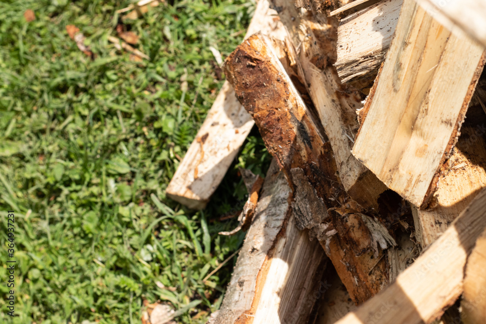 A pile of chopped birch firewood. Harvesting for the winter. A pile of chopped birch firewood. Harvesting for the winter.