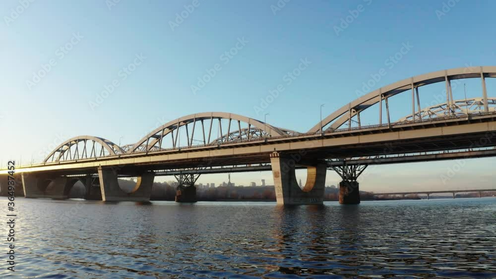 Aerial drone video of a bridge. Modern automobile and old railway bridges in Kiev. Kyiv, Ukraine. Aerial drone video of a bridge. Modern automobile and old railway bridges in Kiev. Kyiv, Ukraine.