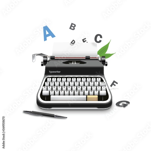 typewriter with alphabet and pen