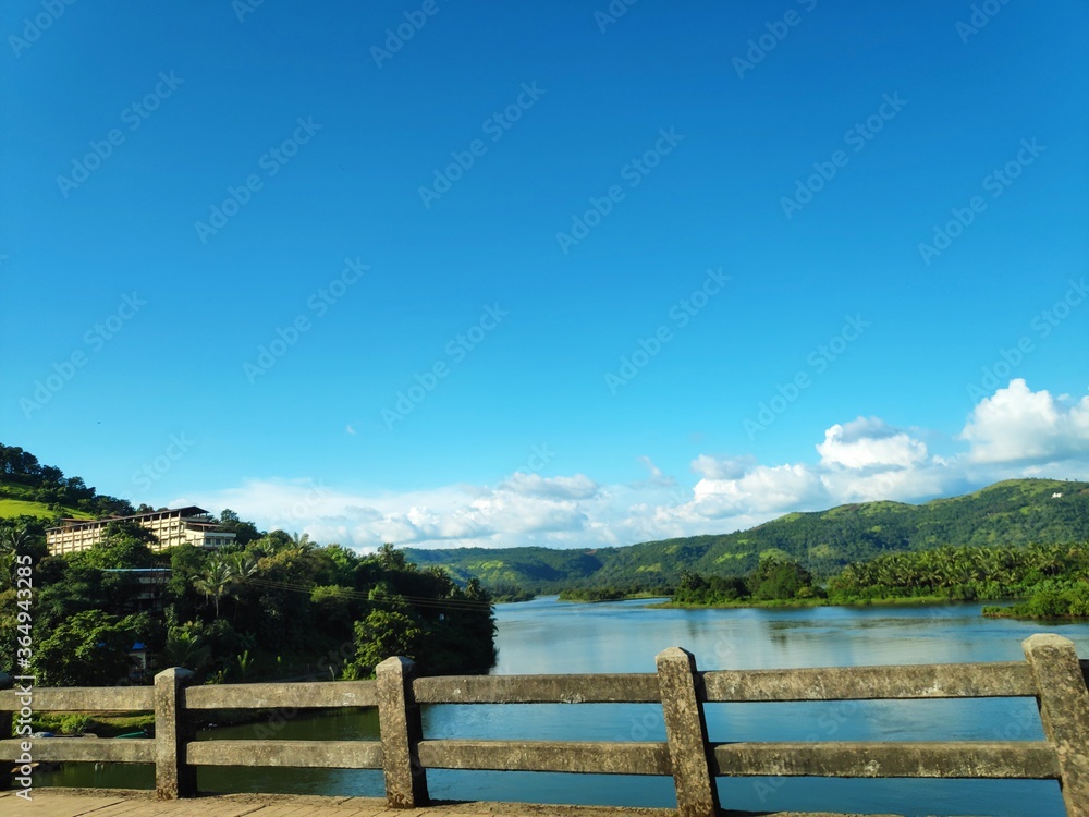 wooden fence on a mountain lake