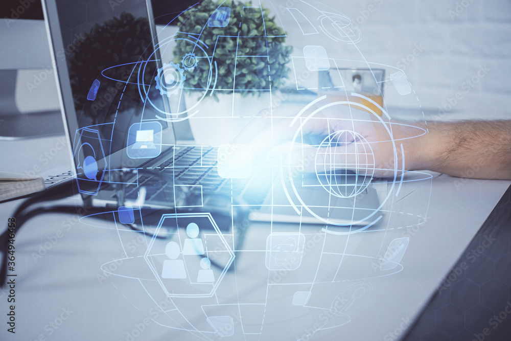 Social network theme hologram with businessman working on computer on background. Multi exposure. Social network theme hologram with businessman working on computer on background. Multi exposure.