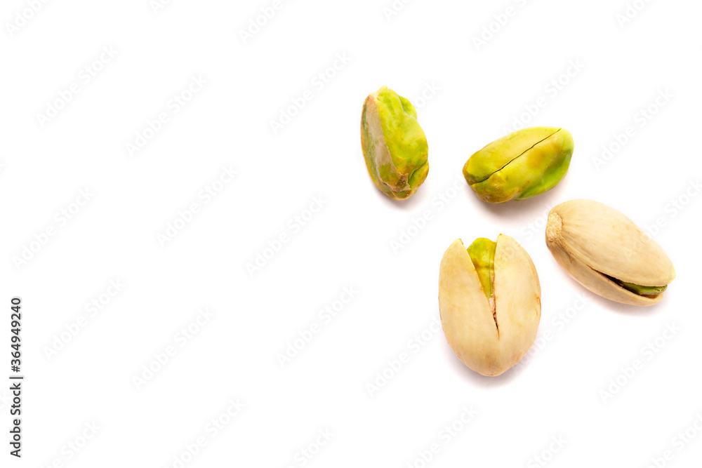 Pistachio nuts on a white background Pistachio nuts on a white background