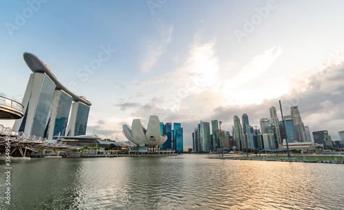 Photography Beautiful architecture building skyscraper around marina bay and sky background in singapore city