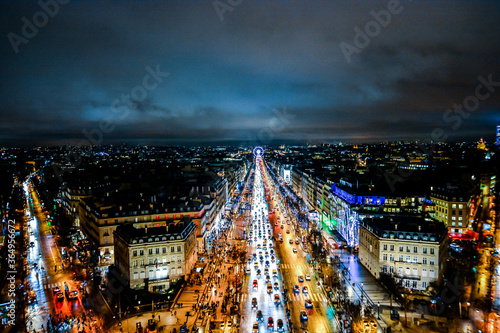 view from Arc de triomphe at night,Photo image a Beautiful panoramic view of Paris Metropolitan City photo