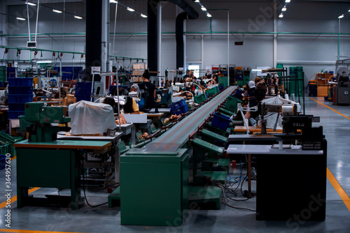 Принти на полотні Shoe making process in footwear factory.