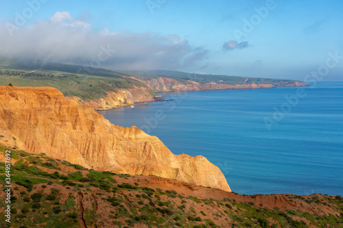 the beautiful blue waters and yellow cliff faces on the fleurieu peninsula at sellicks beach south australia on july 14 2020