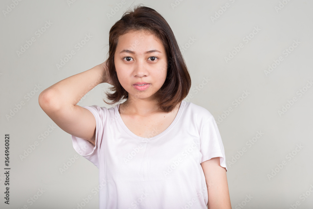 Portrait of young beautiful Asian teenage girl with short hair Portrait of young beautiful Asian teenage girl with short hair