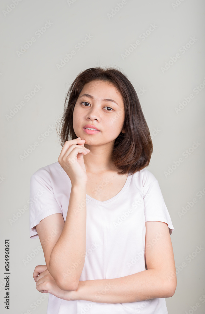 Portrait of young beautiful Asian teenage girl with short hair Portrait of young beautiful Asian teenage girl with short hair