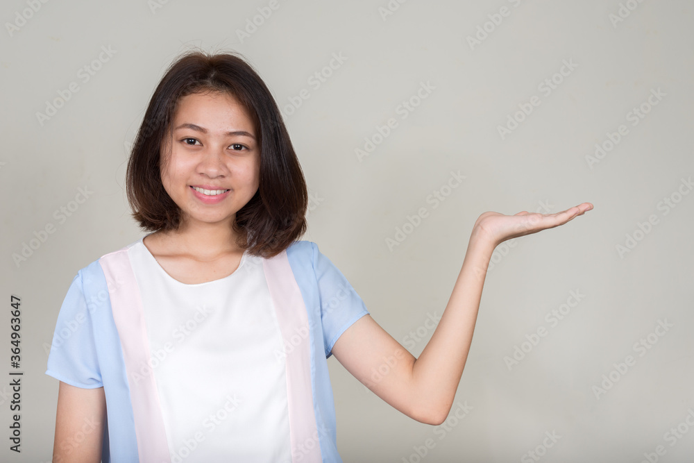 Portrait of young beautiful Asian teenage girl with short hair Portrait of young beautiful Asian teenage girl with short hair