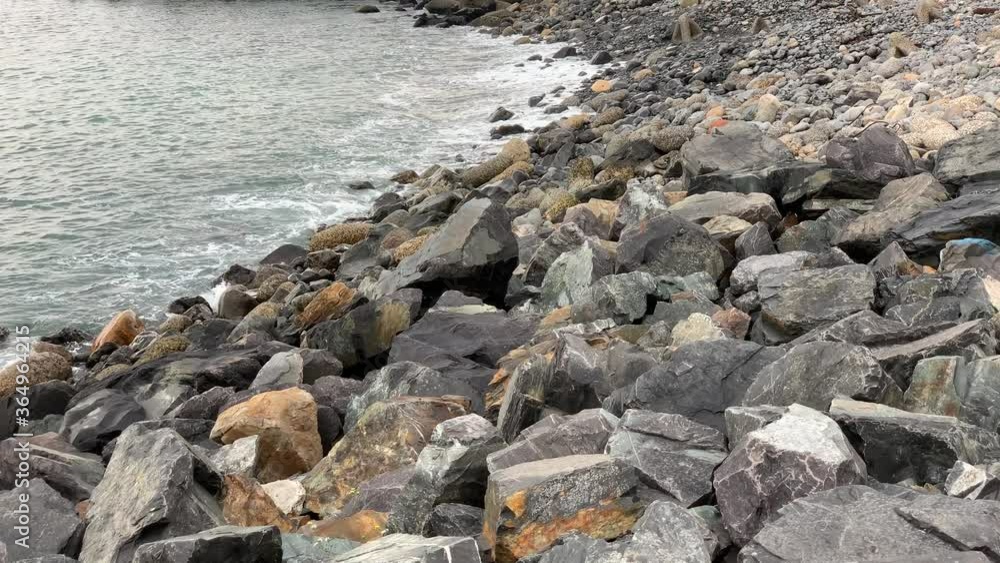 Rocky shoreline on the edge of the Atlantic Ocean Table Bay Rocky shoreline on the edge of the Atlantic Ocean Table Bay