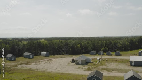 Small idyllic holiday home glambing location by blueberry barrens, Descending aerial  photo