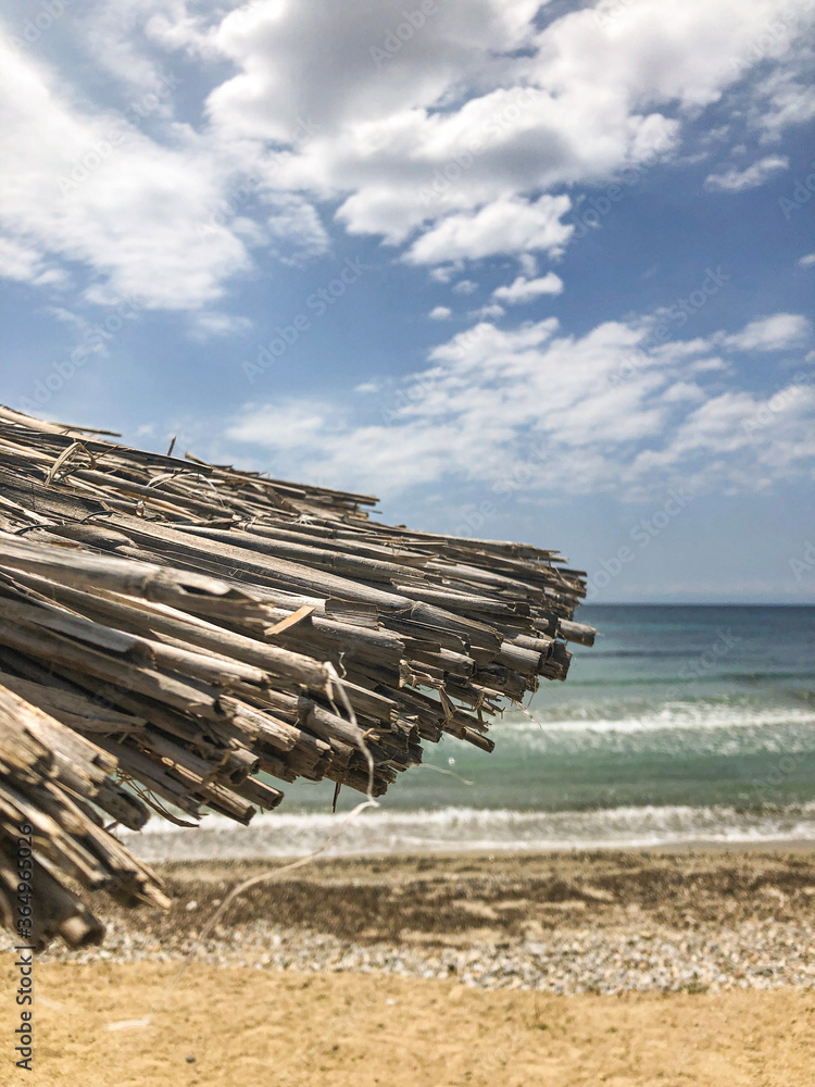 Bamboo Sun Shade Umbrella on the Beach Bamboo Sun Shade Umbrella on the Beach