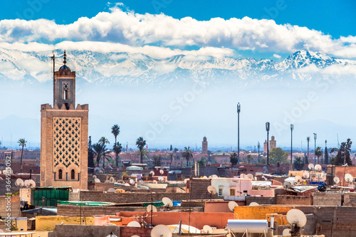 Marrakech / Morocco - Mach 24, 2018: Skyline of the city with the Atlas in the distance