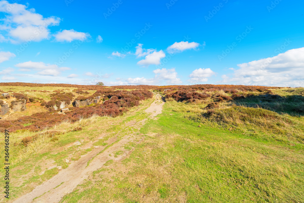 Long, straight footpath over Stanton Moor in the Derbyshire Dales