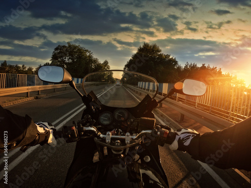 Riding a motorcycle on a beautiful sunny day