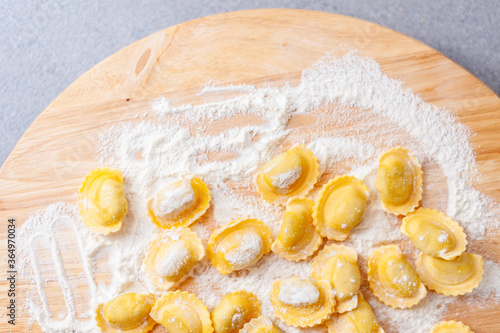 Italian pasta preparation, agnolotti with flour and eggs stuffed with meat, typical Italian food