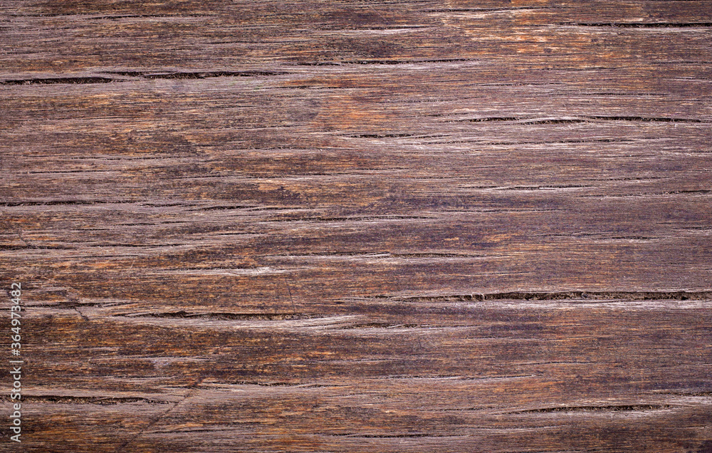 The texture of the old wood. The surface of an old wooden tabletop. Close up. Copy space. The texture of the old wood. The surface of an old wooden tabletop. Close up. Copy space.