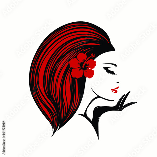 Beautiful woman with elegant makeup and hairstyle, wearing a flower in her hair.Fashion model.Profile view redhead girl portrait.Cosmetics and spa icon.Hair salon and beauty studio.