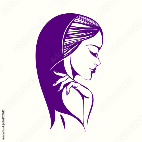 Beautiful woman with elegant makeup and manicure, wearing a textile scar.Fashion icon.Profile view portrait.Cute face.Smiling girl.