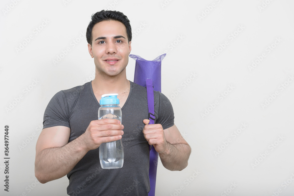 Portrait of young handsome man ready for gym Portrait of young handsome man ready for gym