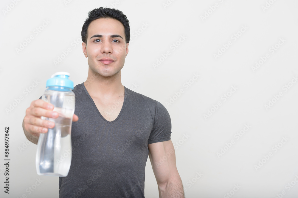 Portrait of young handsome man ready for gym Portrait of young handsome man ready for gym