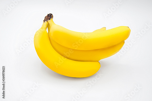 Isolated bunch of ripe bananas over white background