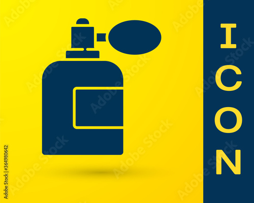 Blue Aftershave bottle with atomizer icon isolated on yellow background. Cologne spray icon. Male perfume bottle. Vector Illustration.