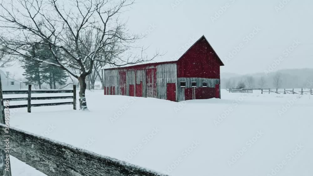 Old barn in snowy winter blizzard. Old barn in snowy winter blizzard.