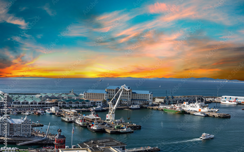 V & A waterfront and harbour at sunset in Cape Town South Africa