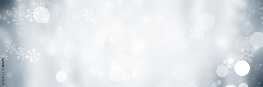 wide white and gray Christmas light with snowflake bokeh background, Winter backdrop wallpaper. wide white and gray Christmas light with snowflake bokeh background, Winter backdrop wallpaper.