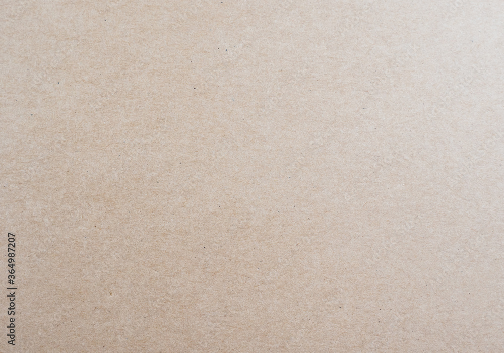 Fototapeta premium Abstract brown recycled paper craft texture background. Old Kraft box paper pattern seamless. top view. 