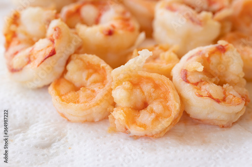 peeled fried prawns isolated on white background close up