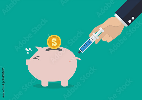 Businessman injecting vaccine into the piggy bank