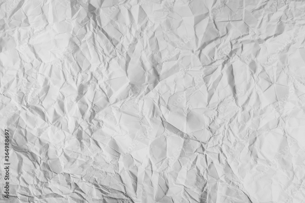 Fototapeta premium Crumpled white paper texture for background and copy text