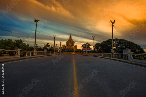 The background of religious attractions in Phitsanulok Province  Wat Chan Tawan Tok  has a distinctive golden yellow sculpture  close to the Nan River  tourists always come to make merit in Thailand