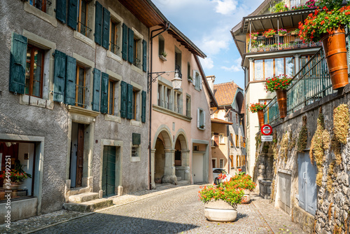 Small street and old colorful houses in the iconic village of Saint-Saphorin in Lavaux Vaud Switzerland