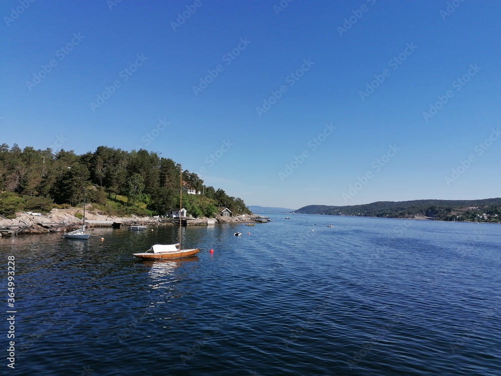 boats on the lake on a summer day boats on the lake on a summer day