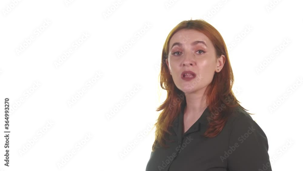 Portrait of a young red haired woman singing a beautiful melody. White background. Isolated Portrait of a young red haired woman singing a beautiful melody. White background. Isolated