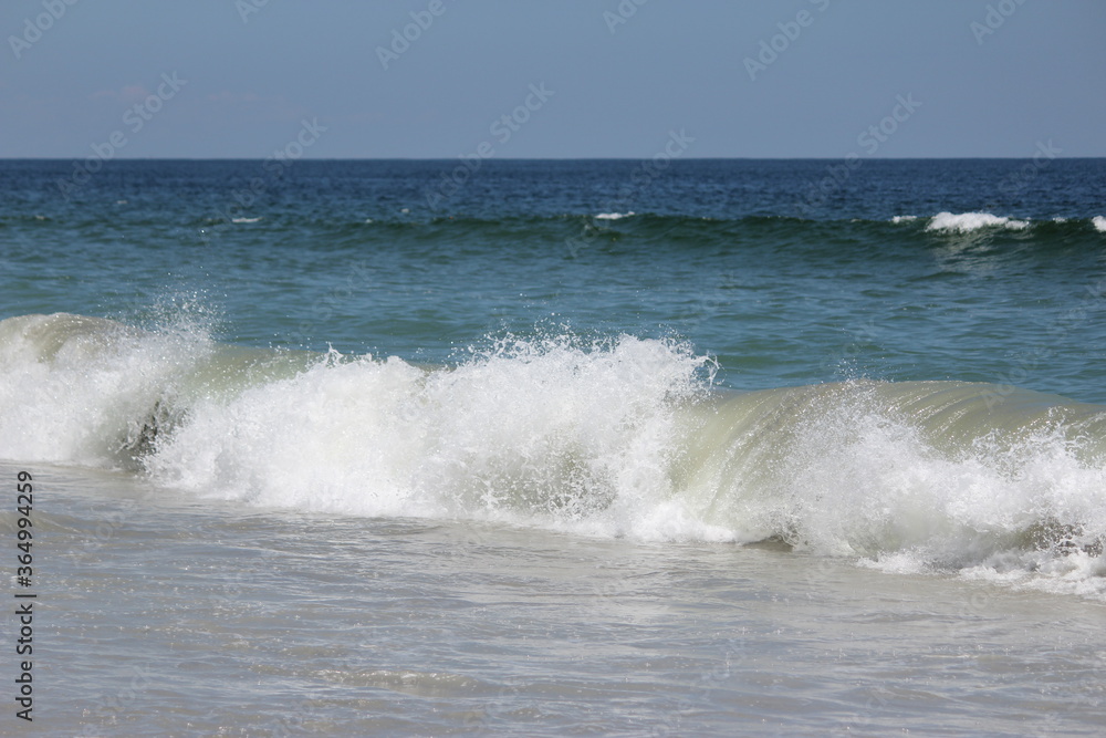 Waves crashing to shore
