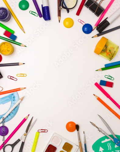Education, office, and object concept. Stationery frame on a white background. Free space for text, top view.