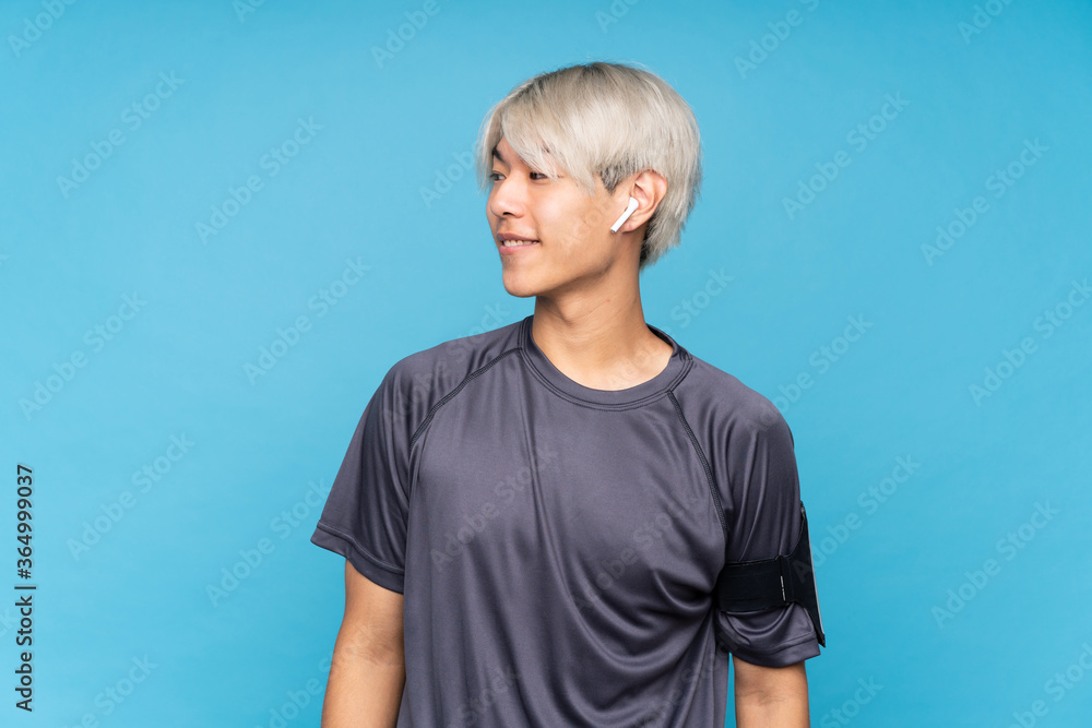 Asian man over isolated background Asian man over isolated background