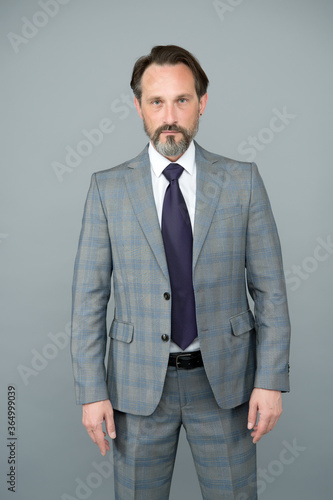 Trendy wardrobe perfect for his style. Mature man in formal style. Stylish lawyer grey background. Business dress code. Formalwear. Professional wear. Fashion style. Giving man sense of style