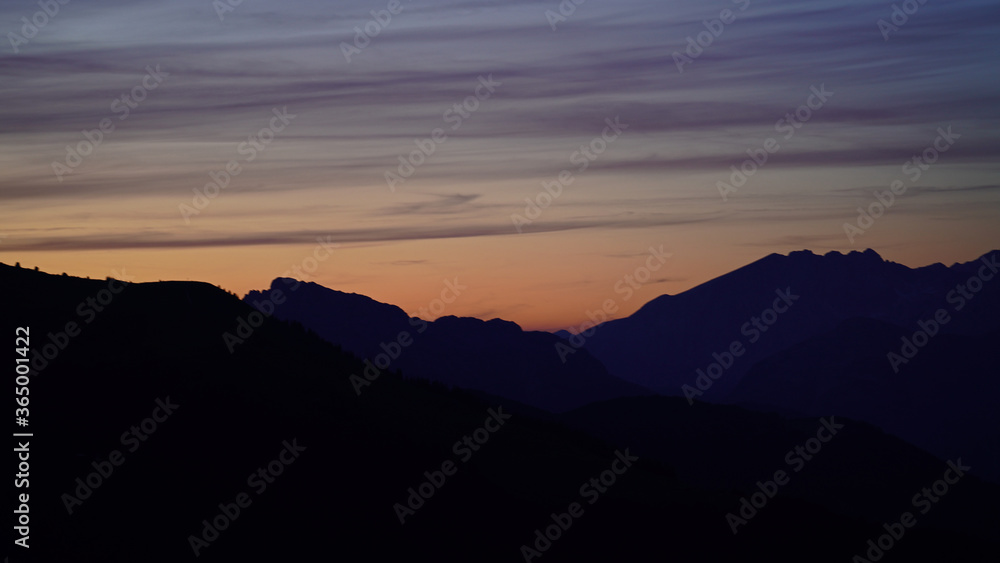 beautiful colorful sunset on the mountains with view to the alps