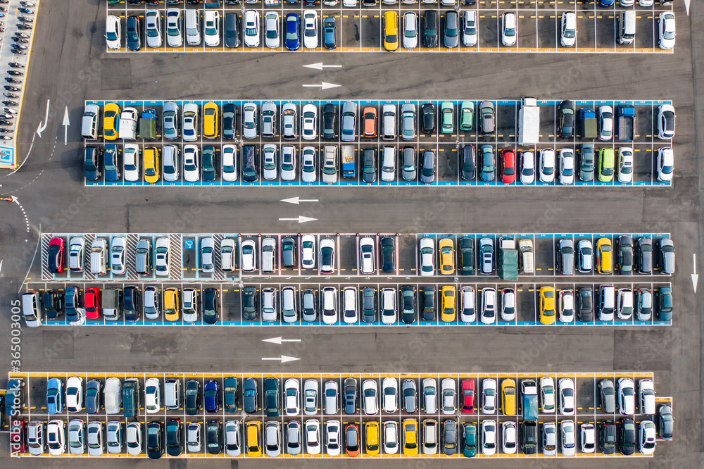 Empty parking lots, aerial view. A lot of cars in the parking lot. Colorful moody drone shoot. Empty parking lots, aerial view. A lot of cars in the parking lot. Colorful moody drone shoot.
