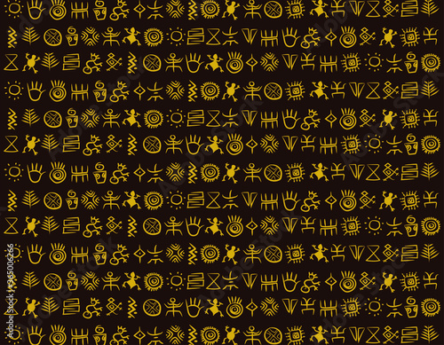 Yellow ancient native american and indigenous rock painting pattern over a dark brown background