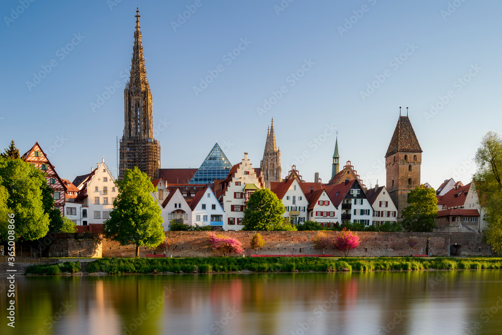 Ulmer minster in the morning at sunrise with reflection in river danube. Ulm 2020 spring Ulmer minster in the morning at sunrise with reflection in river danube. Ulm 2020 spring