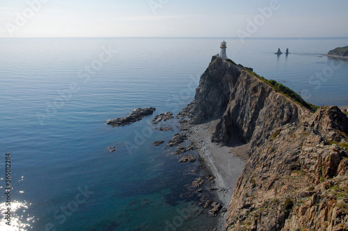 View at Rudny lighthouse and Two Brothers sea stacks (rock, island). Outskirts of Rudnaya Pristan town, Primorsky Krai (Primorye), Far East, Russia. photo