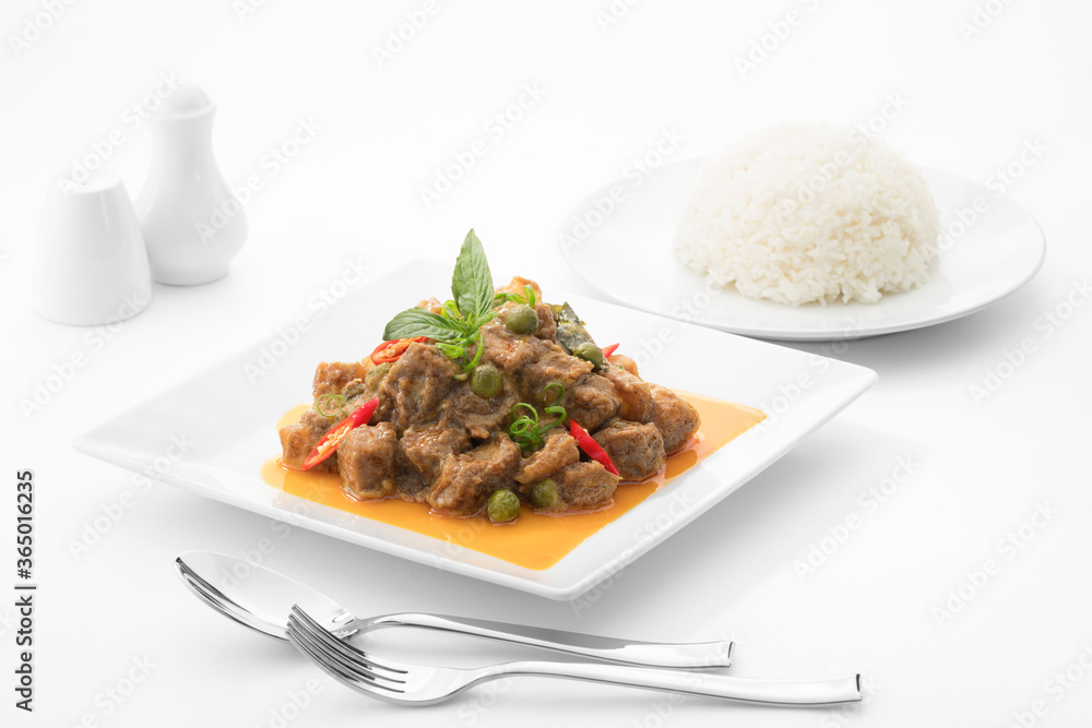 Close up view of fried beef with vegetables on white back Close up view of fried beef with vegetables on white back